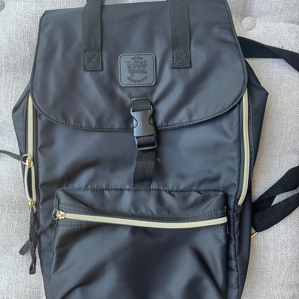T-Shirt and Jeans Black Backpack with Gold Accents